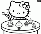 Hello Kitty с ложкой в руках, готовые к употреблению некоторые вкусные кексы. Hello Kitty любит сладости, она очень жадные